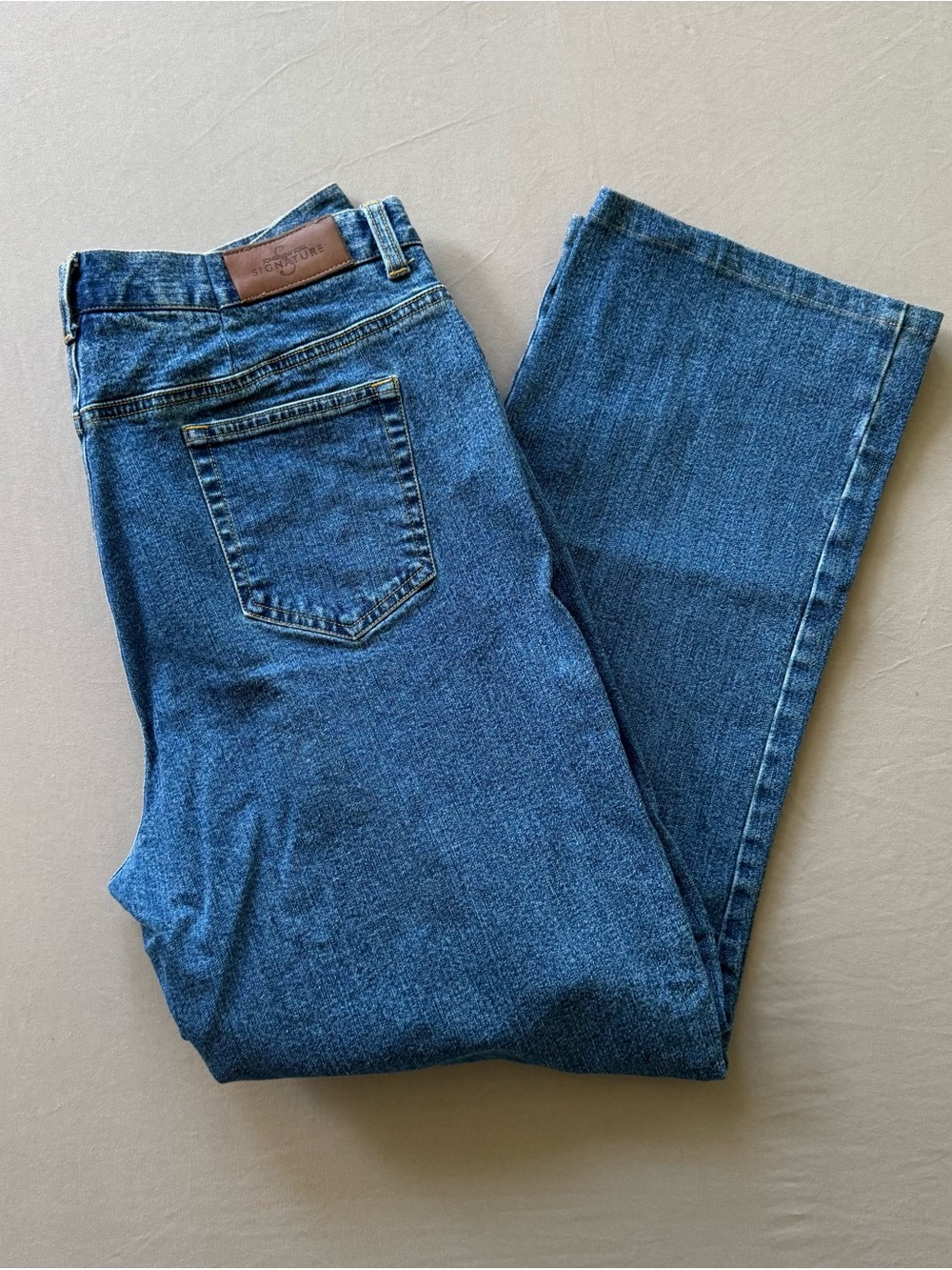 Classic High-Rise Blue Women's Signature Jeans. 14